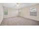 Large bedroom with ceiling fan and neutral color palette at 20 W Cooper Canyon Rd, San Tan Valley, AZ 85143