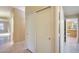 Hallway with tile flooring and access to other rooms at 22852 N 103Rd Ave, Peoria, AZ 85383