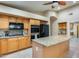 Updated kitchen offering a large island, stainless appliances, and stylish cabinetry at 22852 N 103Rd Ave, Peoria, AZ 85383