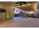 Covered patio overlooking pool with ceiling fan and outdoor access to the yard at 22852 N 103Rd Ave, Peoria, AZ 85383