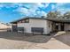 View of the home's side, showcasing the clean lines and design at 2371 E Larkspur Dr, Phoenix, AZ 85022