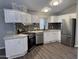 Modern kitchen features stainless steel appliances and white cabinets at 2787 W Cactus Wren St, Apache Junction, AZ 85120