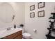 Stylish bathroom with a vanity and decorative wall art at 2796 E Inca Ln, San Tan Valley, AZ 85140