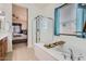 Main bathroom with a large soaking tub and shower at 2796 E Inca Ln, San Tan Valley, AZ 85140