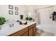 Clean bathroom with double sinks and shower/tub combo at 2796 E Inca Ln, San Tan Valley, AZ 85140