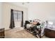Bright bedroom with a daybed and window coverings at 2796 E Inca Ln, San Tan Valley, AZ 85140