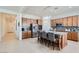Modern kitchen with granite countertops and an island with seating at 2796 E Inca Ln, San Tan Valley, AZ 85140