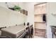 Laundry room with washer, dryer, and built-in shelving at 2796 E Inca Ln, San Tan Valley, AZ 85140