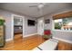 Living room with hardwood floors and view into main bedroom at 28 E Hoover Ave, Phoenix, AZ 85004