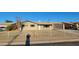 Ranch style home with a fenced front yard at 3020 N 52Nd Pkwy, Phoenix, AZ 85031