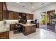 Bright home office with built-in cabinetry and large windows at 30508 N 64Th St, Cave Creek, AZ 85331