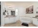 Bathroom with large soaking tub and double vanity at 3315 N Datura Ct, Maricopa, AZ 85139