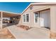 Front view of the home with a walkway and landscaping at 3315 N Datura Ct, Maricopa, AZ 85139
