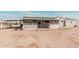 Ranch style home with covered patio and spacious backyard at 3315 N Datura Ct, Maricopa, AZ 85139