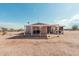 Single story house with covered patio and large yard at 3315 N Datura Ct, Maricopa, AZ 85139
