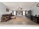 Spacious living room with a large TV and comfortable seating at 3315 N Datura Ct, Maricopa, AZ 85139