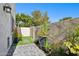 Landscaped courtyard with artificial turf and potted plants at 4301 N 21St St # 21, Phoenix, AZ 85016