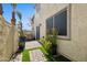 Private backyard patio with brick pavers and potted plants at 4301 N 21St St # 21, Phoenix, AZ 85016