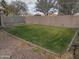 Large grassy backyard with stone border at 4330 E South Fork Dr, Phoenix, AZ 85044