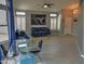 Living room with blue velvet sofas and glass-top dining table at 4330 E South Fork Dr, Phoenix, AZ 85044