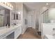 Clean bathroom with double vanity and shower at 44230 W Palmen Dr, Maricopa, AZ 85138