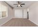 Simple bedroom with sliding door closet at 44230 W Palmen Dr, Maricopa, AZ 85138