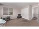 Bedroom with closet, window and small table and chairs at 44230 W Palmen Dr, Maricopa, AZ 85138