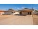 Front view of the house, highlighting the carport and yard at 4613 N 53Rd Dr, Phoenix, AZ 85031