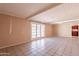 Living room with tile floors and backyard access at 4613 N 53Rd Dr, Phoenix, AZ 85031