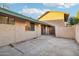 A small, private patio area behind the condo at 4648 W Continental Dr, Glendale, AZ 85308