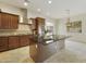 Spacious kitchen featuring stainless steel appliances and granite island at 4937 S Pulse Ter, Mesa, AZ 85212