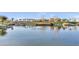 Serene community lake with a scenic walking path at 4937 S Pulse Ter, Mesa, AZ 85212