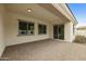 Covered patio with brick pavers and sliding glass doors at 4937 S Pulse Ter, Mesa, AZ 85212