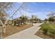 Community playground with playset and walking path at 4937 S Pulse Ter, Mesa, AZ 85212