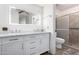 Bathroom featuring a double vanity and shower at 507 S Sand Verbena Way, Mesa, AZ 85208