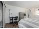 Bright bedroom with a comfortable bed and built-in desk at 507 S Sand Verbena Way, Mesa, AZ 85208