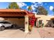 Covered parking and lush landscaping enhance this home's exterior at 507 S Sand Verbena Way, Mesa, AZ 85208
