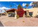 This home features covered parking and a lush garden at 507 S Sand Verbena Way, Mesa, AZ 85208