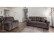 Living room with comfortable seating and a view to kitchen at 507 S Sand Verbena Way, Mesa, AZ 85208