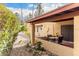 Covered patio with seating area and desert landscaping at 507 S Sand Verbena Way, Mesa, AZ 85208