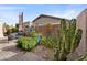 Landscaped backyard with desert plants and seating at 5241 E Ingram St, Mesa, AZ 85205