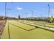 Well-maintained bocce ball court with benches at 5633 S Crowley --, Mesa, AZ 85212