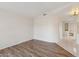 Living room with hardwood floors and curved wall at 6043 E Quince St, Mesa, AZ 85215