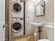 Bathroom features stackable washer and dryer at 6501 N 17Th Ave # 112, Phoenix, AZ 85015