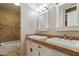 Bathroom with double sinks and granite countertops at 6501 N 17Th Ave # 112, Phoenix, AZ 85015