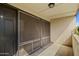 Private entryway with screen door and light fixture at 6501 N 17Th Ave # 112, Phoenix, AZ 85015