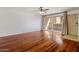 Living room with hardwood floors and door to outside at 6501 N 17Th Ave # 112, Phoenix, AZ 85015