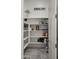 Well-organized pantry with ample shelving for storage needs at 6675 S Giralda Ave, Gilbert, AZ 85298