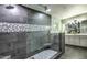 Elegant bathroom with a large walk-in shower and double vanity at 6803 E Main St # 1110, Scottsdale, AZ 85251