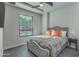 Comfortable bedroom with a queen-size bed and large window at 6803 E Main St # 1110, Scottsdale, AZ 85251